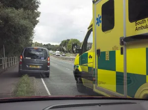 Ambulance attending road traffic accident, A35 Hampshire 2017. Creator: Unknown