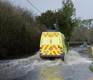 Flooding Prints: Ambulance driving through Floods at Beauleu 2008