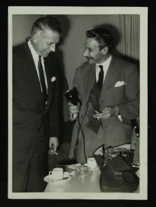 Questioning Prints: American bandleader Stan Kenton giving an interview, c1950s. Artist: Denis Williams