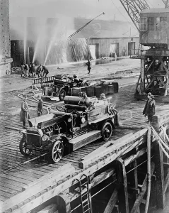 Firefighting Prints: American Firemen, Bassens, 1919. Creator: Bain News Service