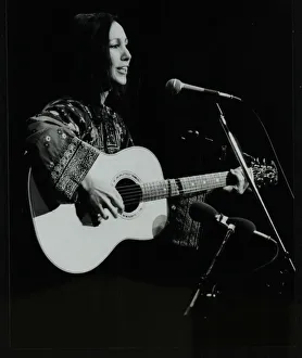 American folk musician Julie Felix performing at the Forum Theatre, Hatfield, Hertfordshire