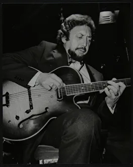 Barney Prints: American guitarist Barney Kessel playing at the Middlesex and Herts Country Club