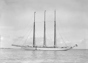 Wells Prints: The American three mast schooner Karina at anchor, 1912. Creator: Kirk & Sons of Cowes