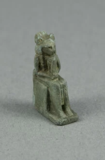 Bast Collection: Amulet of a Seated Lion-headed Goddess Holding a Sistrum, possibly Bastet, Egypt, Third
