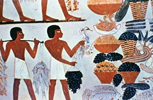 Ancient Egyptian wall paintings in a tomb at Thebes, Egypt