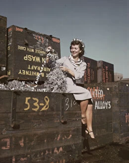 Yard Gallery: Annette del Sur publicizing salvage campaign...Douglas Aircraft Company, Long Beach, Calif. 1942