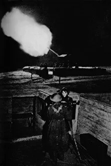 Blitz Gallery: Anti-aircraft women of the ATS operating an identification telescope, 1943