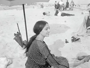 Ponytail Prints: Aoliado, Miss, at the beach, between 1920 and 1935. Creator: Arnold Genthe