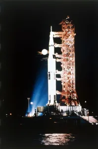 Launch Prints: Apollo 9 Saturn V rocket with full moon, 1969. Creator: NASA
