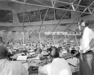 Headphones Prints: Apollo director Phillips monitors Apollo 11 pre-launch activities, Florida, USA, 1969
