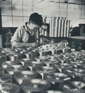 Apprentice with microscope (testing the hardness of pistons), 1941. Artist: Cecil Beaton Apprentice with microscope (testing the hardness of pistons), 1941. Artist: Cecil Beaton
