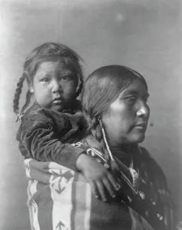 Tribeswoman Prints: Apsaroke mother, c1908. Creator: Edward Sheriff Curtis