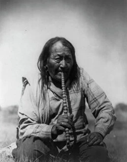 Tobacco Collection: Arapaho Indian smoking pipe, c1910. Creator: Edward Sheriff Curtis