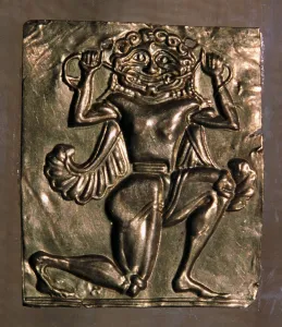 Archaic Greek gold plaque of a running gorgon, 7th century BC Archaic Greek gold plaque of a running gorgon, 7th century BC
