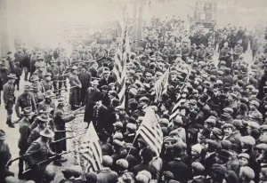 Striker Prints: Armed troops confronting protesters during an industrial dispute, USA, 1912. Artist