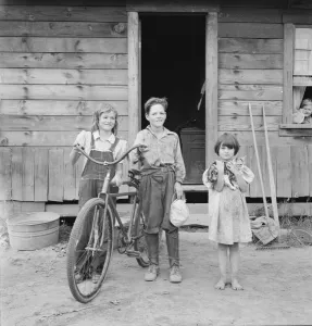 Rake Prints: Three of the four Arnold children
