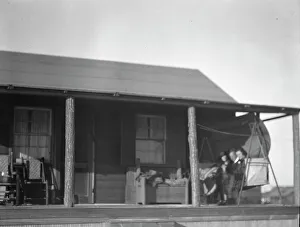Bungalow Prints: Arnold Genthe and two women friends seated on a swing on the porch of his