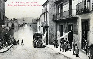 Arrival of a car on the streets of Sant Feliu de Codines, postcard from 1912