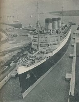 Cunard Gallery: Arrival of RMS Cunard White Star liner Queen Mary in King George V Graving Dock, 1936