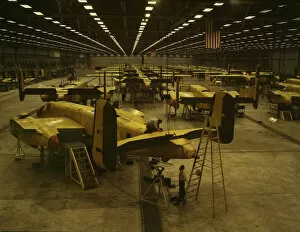 Assembly Line Methods Collection: Assembling B-25 bombers at North American Aviation, Kansas City, Kansas, 1942