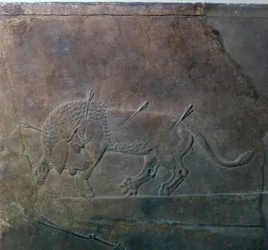 Assyrian relief of a wounded lion from Ashurbanipal, 7th century Assyrian relief of a wounded lion from Ashurbanipal, 7th century