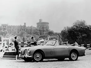 Elegance Prints: An Aston Martin DB2-4 MKII, with Windsor Castle in the background, 1956