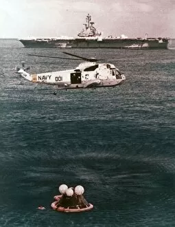 Charles M Gallery: Astronauts being recovered from the sea, Apollo 16 mission, 27 April 1972. Creator: NASA