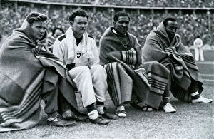 Winning Gallery: Athletes Frank Wykoff, Paul Hanni, Ralph Metcalfe and Jesse Owens, Berlin Olympics, 1936