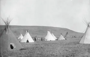 Tipis Prints: Atsina camp scene, c1908. Creator: Edward Sheriff Curtis