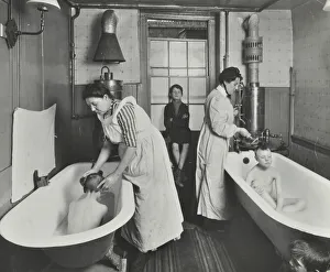 Washing Prints: Attendants bathing boys at the Central Street Cleansing Station, London, 1914