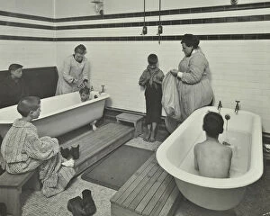 Cleanliness Collection: Attendants bathing boys at the Sun Court Cleansing Station, London, 1914
