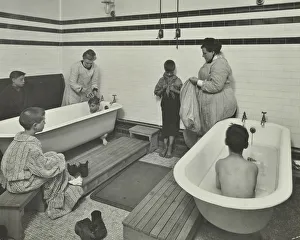 Washing Prints: Attendants bathing boys at the Sun Court Cleansing Station, London, 1914