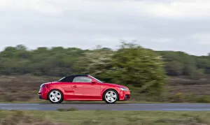 Cabriolet Gallery: Audi TT cabriolet driving in New Forest. Creator: Unknown
