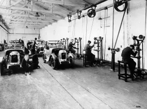 Factory Worker Prints: Austin Sevens being fitted with Swallow bodies. Foldshill[?] 1929