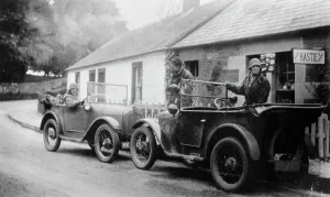 Motorist Prints: Two Austin Sevens parked outside a small tea shop, c1925