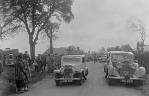 Fur Coat Gallery: Austin sports saloon of Mrs MS Flewitt and Rolls-Royce saloon at the RSAC Scottish Rally, 1934