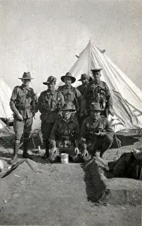 Crouching Prints: Australians in front of tent at Aerodrome, Egypt, 1916. Creator: Unknown