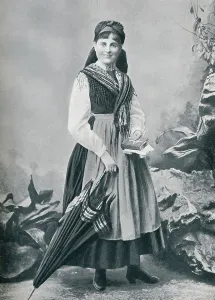 An Austrian girl in the national costume, 1912. Artist: R Lechner An Austrian girl in the national costume, 1912. Artist: R Lechner