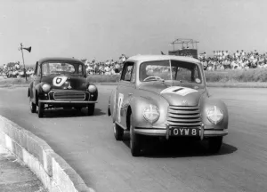 Overtaking Prints: Auto Union-DKW racing Morris Minor at Silverstone 1958. Creator: Unknown