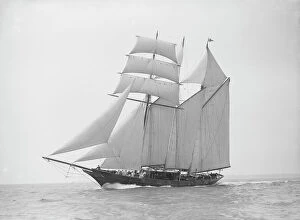 The auxiliary schooner La Cigale sailing close-hauled, 1913. Creator: Kirk & Sons of Cowes
