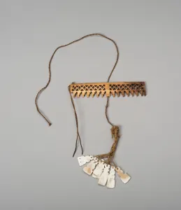 String Gallery: Balance-Beam Scale with Geometric Cut-out Motifs and String holding Shell Pendants, A.D