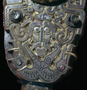 Detail of a baldrick buckle showing a human figure, 6th century Detail of a baldrick buckle showing a human figure, 6th century