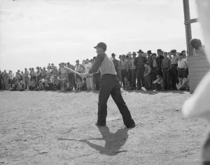 Baseball Bat Prints: Ball game, Shafter migrant camp, California, 1938. Creator: Dorothea Lange