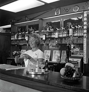 Bar of the Cavalier pub, Ravenfield, near Rotherham, South Yorkshire, 1963. Artist
