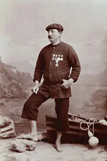 Buoy Prints: A barefoot Basque fisherman posing with several medals on his tunic