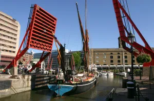 Barge passing through St Katherines Lock, London