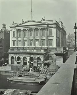 Barges and goods in front of Fishmongers Hall, seen from London Bridge, 1912