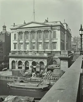 Barges and goods in front of Fishmongers Hall, seen from London Bridge, 1912 Barges and goods in front of Fishmongers Hall, seen from London Bridge, 1912