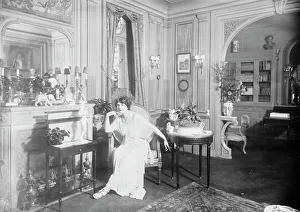 Pensive Prints: Baroness de Guestre [in home], between c1910 and c1915. Creator: Bain News Service