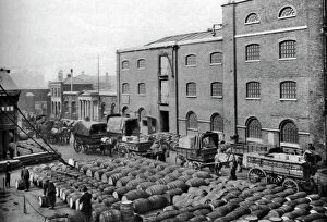 Adcock Collection: Barrels of molasses, West India Docks, London, 1926-1927. Artist: Langfier Photo